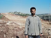 A gardener living outside Qalqilya. The wall will run through the community separating people from their agricultural land and from their families.
