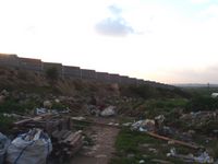 A wall around a settlement nearby Ras Atiya