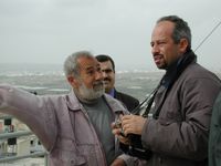 A man from Ras Atiya who has lost land, discusses the wall with Jamal Juma coordinator of the NGO - The Apartheid Wall Campaign.