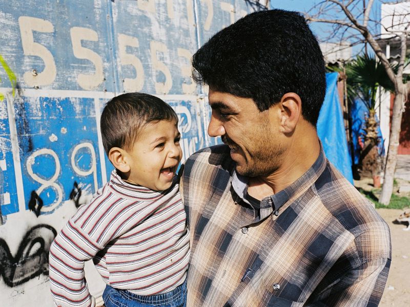 One of the brothers with his son