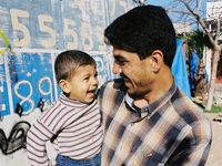 One of the brothers with his son