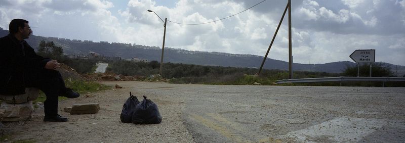 All the roads leading in to Palestinain villages are blocked. No vehicles can enter or leave the villages. All transports have to stop at the roadblock and the load have to be carried over and re-loaded on another vehicle on the other side  